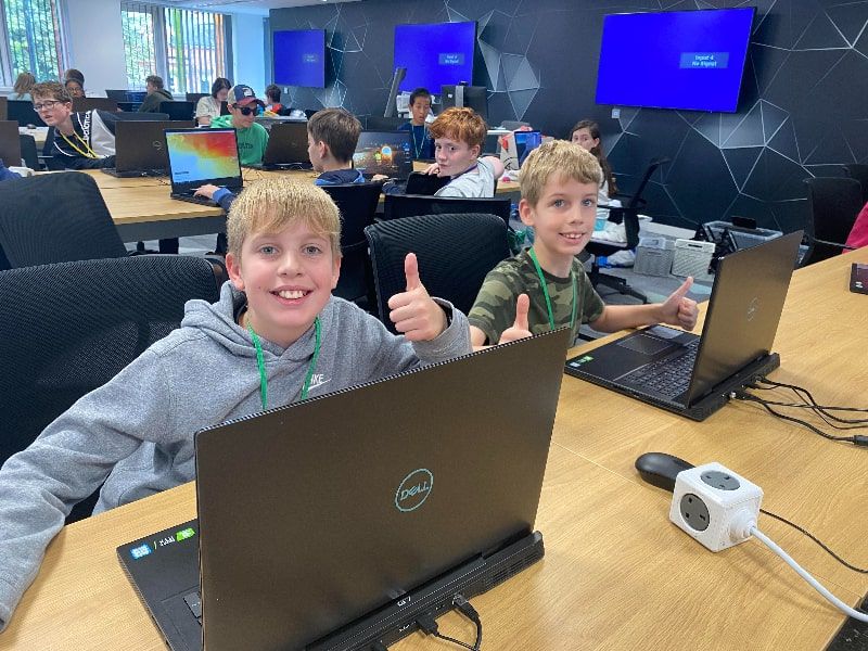 Junior coders getting to grips with Python at Code Clock Summer School