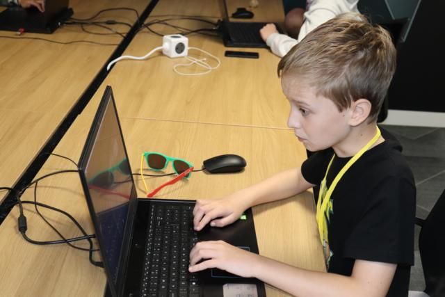 Young coder gets to grip with Python at Code Clock Summer School